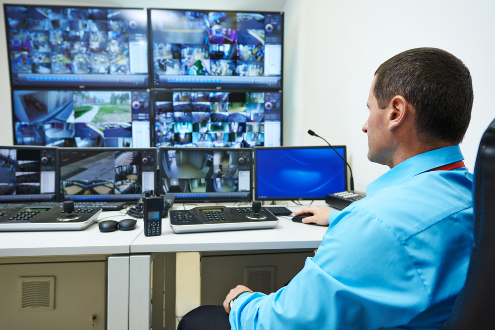 security guard watching cctv