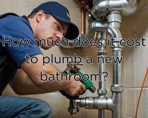 plumber plumbing a bathroom