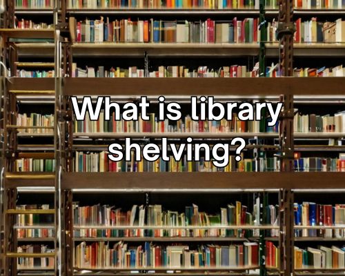 A library with rows of shelves filled with books, organized by category and labeled with clear signage. The shelves are well-lit and the books are neatly arranged