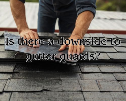 a gutter guard under repair by a homeowner