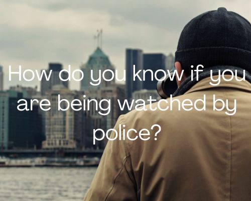 a police undercover watching from afar