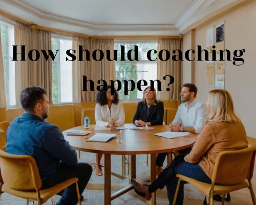 a group of individuals having a coaching session