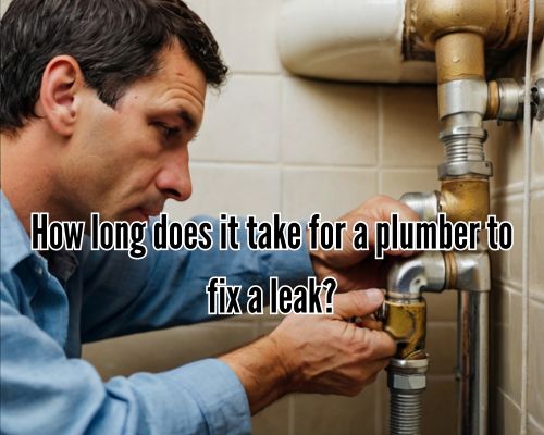 Plumber using wrench to stop pipe leak.